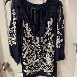 Large navy with cream embroidered trim, Inc.